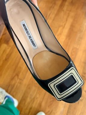 Black patent Manolo Blahnik peep-toe pumps. Size 38.5